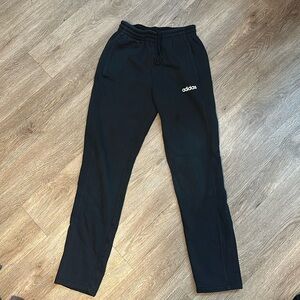 Black adidas sweatpants.